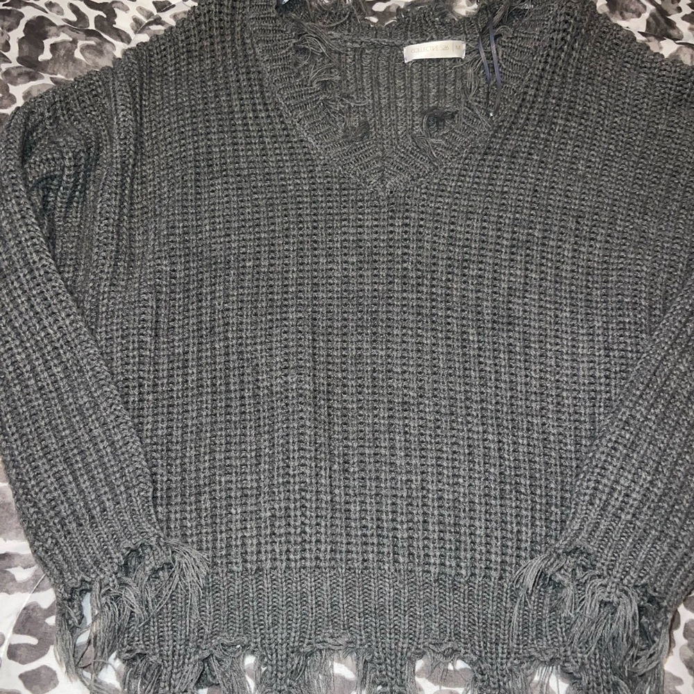 Distressed sweater